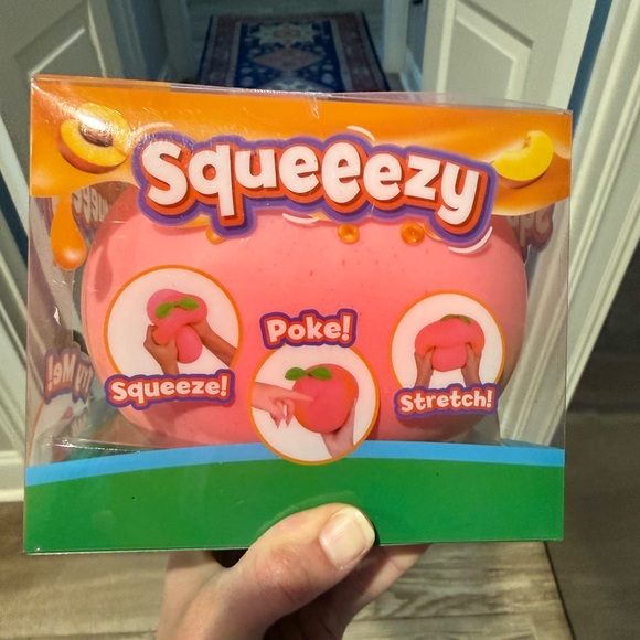 Sunny Days Squeezy Peach squishy. TikTok favorite! - Picture 3 of 5